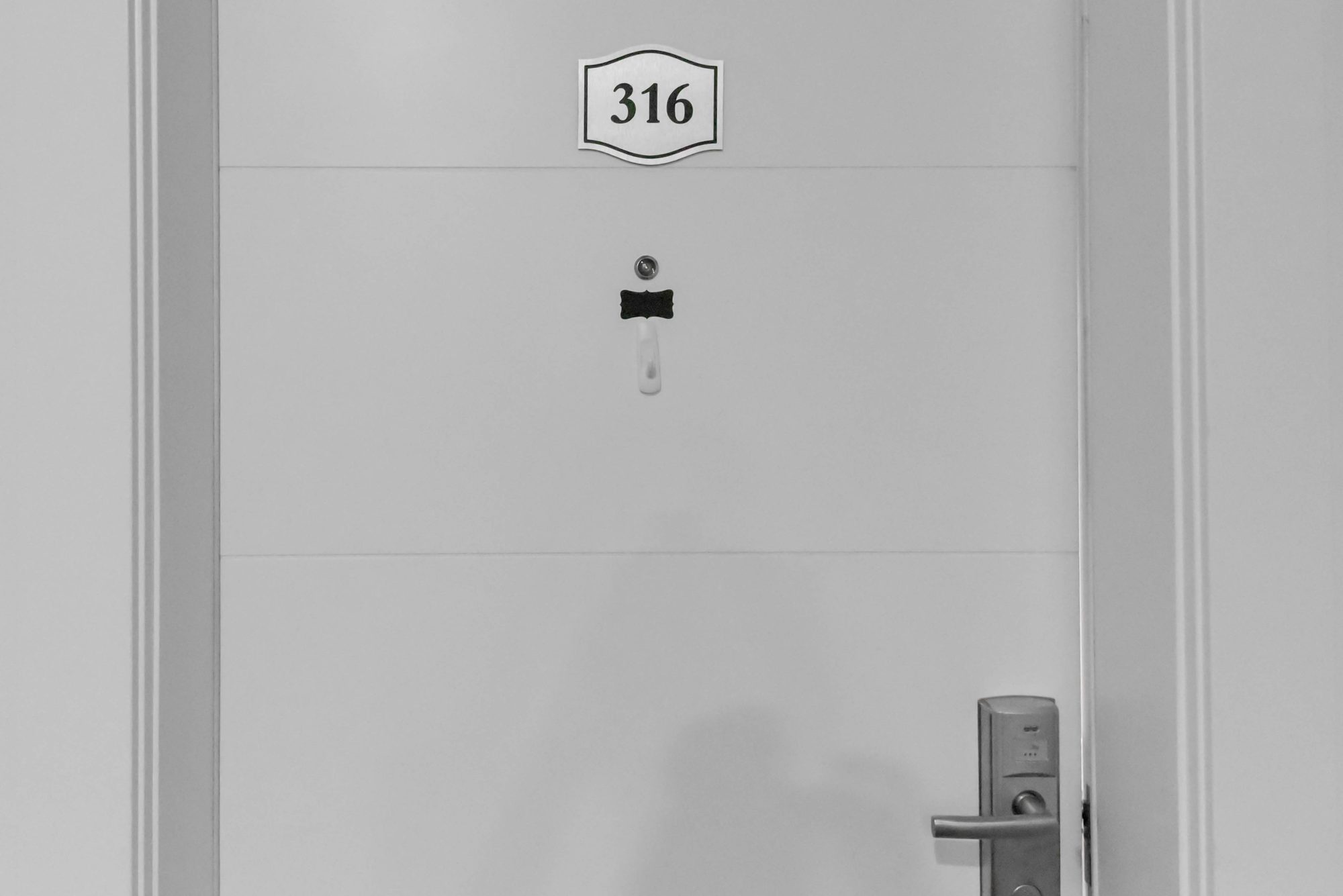 Entry door of a two bedroom suite at The Metro 1827
